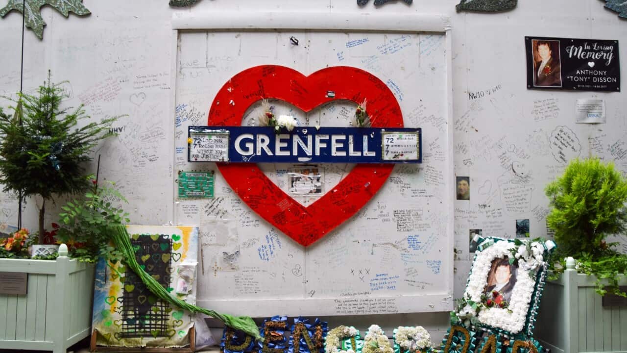 Tributes are seen on the Grenfell Tower memorial wall (AAP)