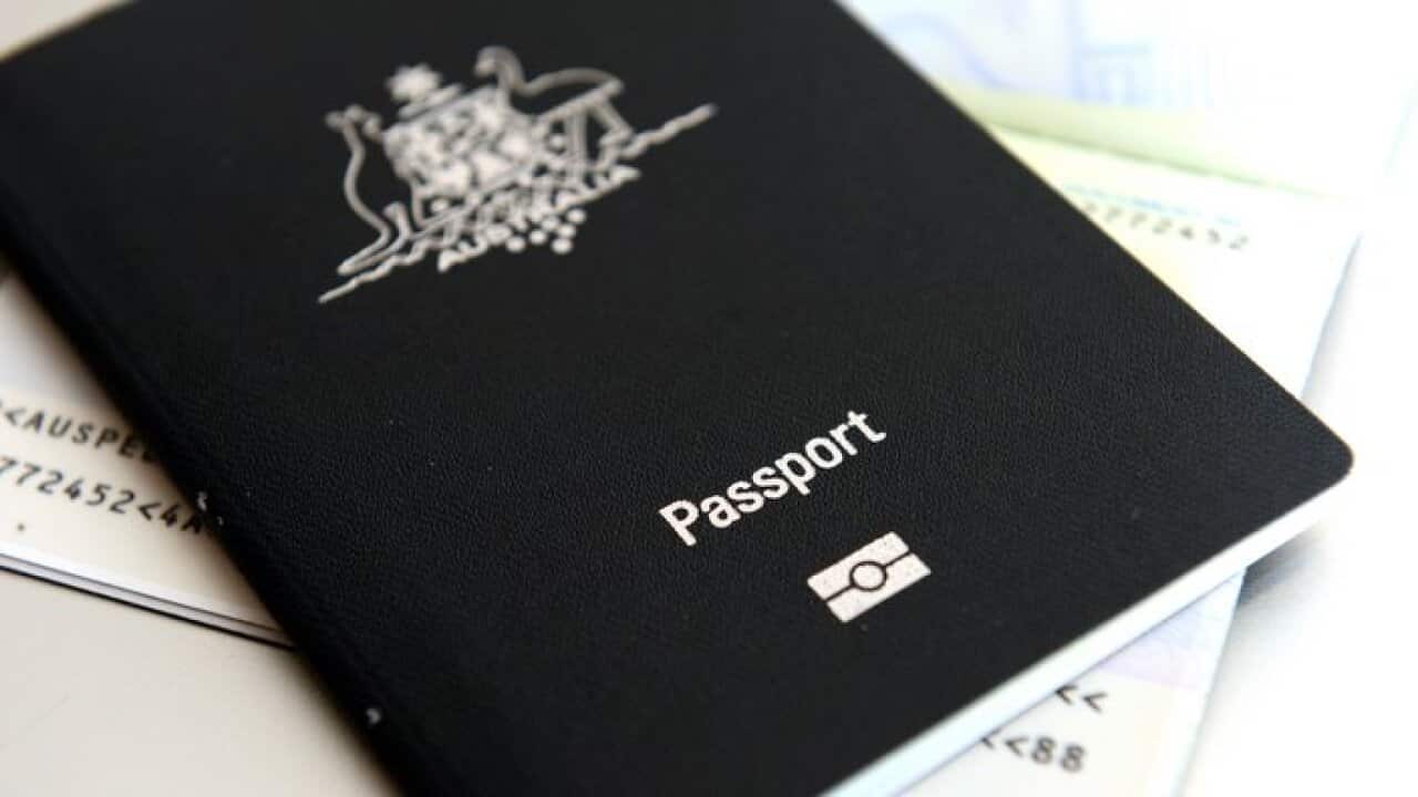 An Australian passport pictured in Brisbane, Thursday, July 25, 2013. (AAP Image/Dan Peled) NO ARCHIVING