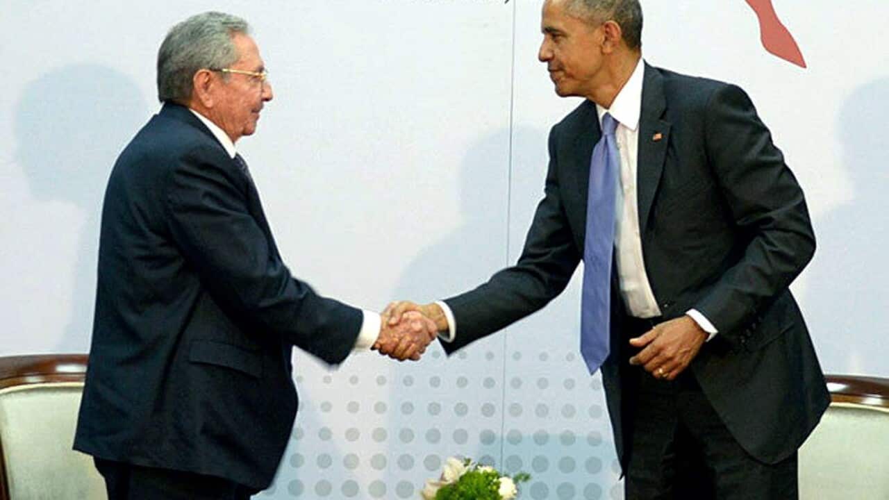 US President Barack Obama (R) shaking hands with Cuban President Raul Castro (L) during their historic meeting at the seventh Summit of the Americas in Panama City, Panama (EPA)