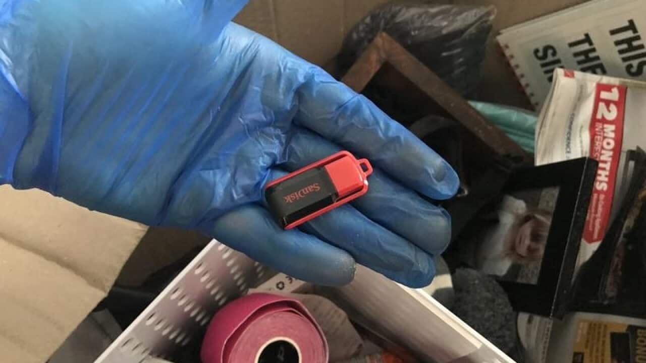 Supplied image of seized items from Queensland search warrants