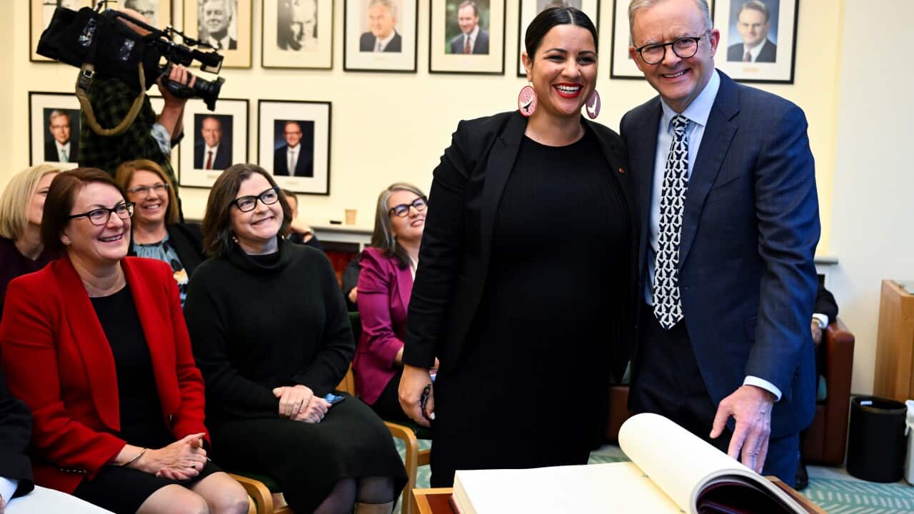 Australian Prime Minister Anthony Albanese congratulates Labor senator Jana Stewart after signing the Labor Caucus book during a Labor Party Caucus at Parliament House in Canberra, Tuesday, May 31, 2022. (AAP Image/Lukas Coch) NO ARCHIVING