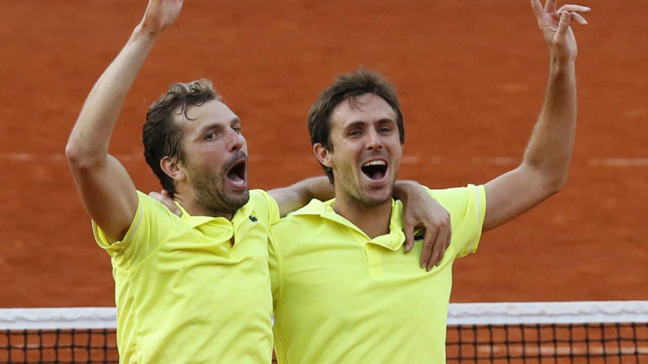 Julien Benneteau and Edouard Roger-Vasselin celebrate
