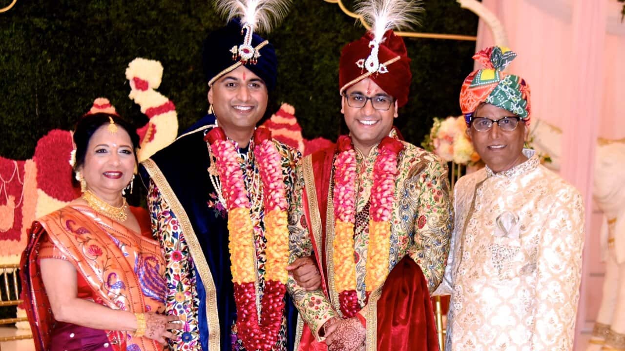 Dr Vijay Mehta with his son (R).