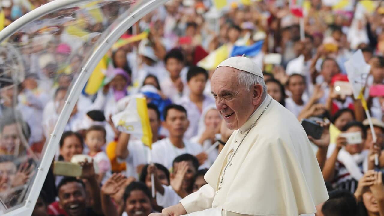 Pope Francis stands on the Popemobile as he arrives to lead a mass at Kyaikkasan grounds in Yangon, Myanmar, 29 November 2017. Pope Francis' visit in Myanmar and Bangladesh runs from 27 November to 02 December 2017. EPA/LYNN BO BO