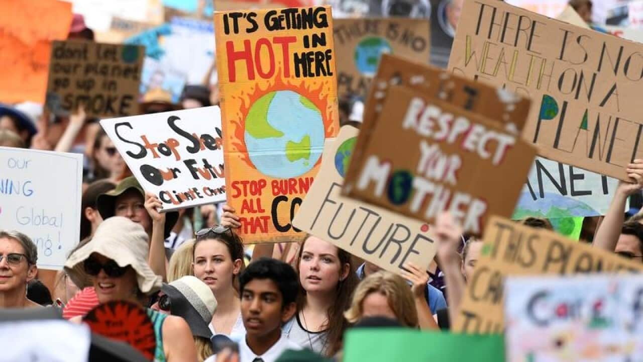 School students take part in a climate change strike in Brisbane.