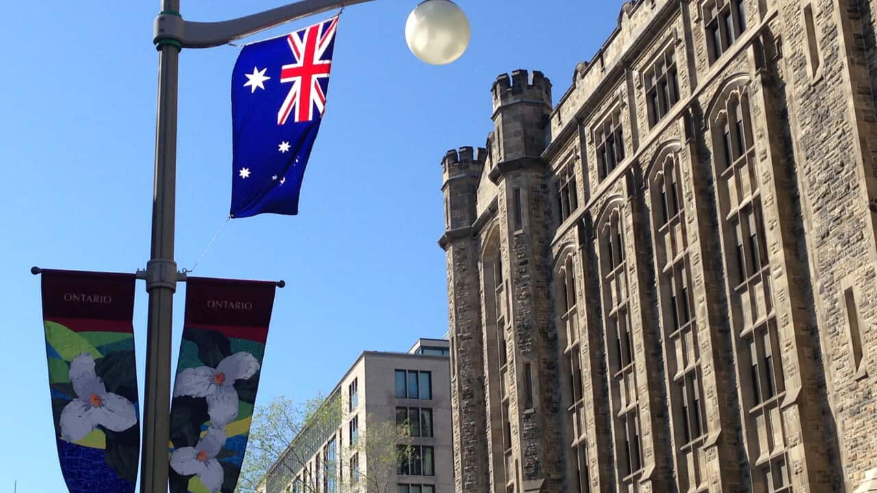 Australia's flag flies in Ottawa to mark Tony Abbott's visit (aap).jpg
