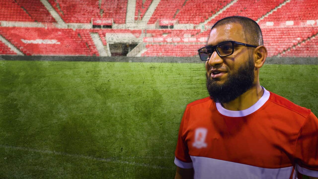 A man wearing a football jersey.