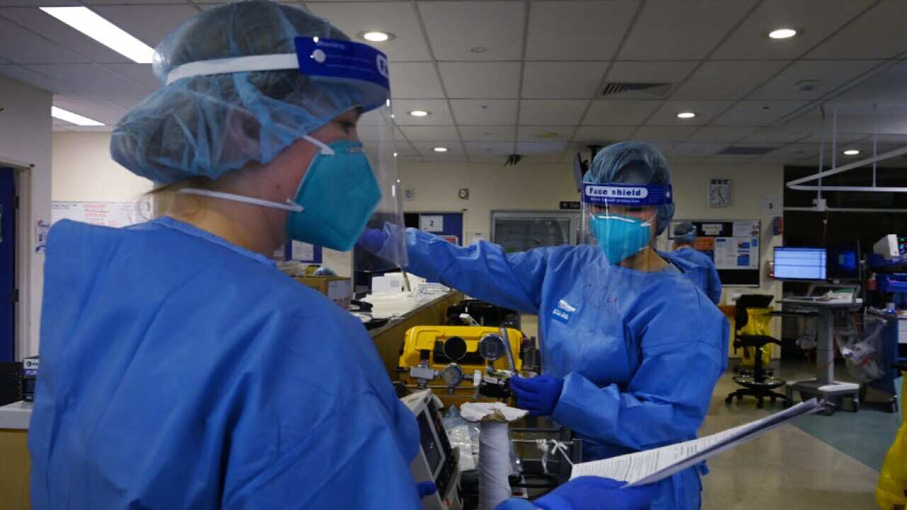 A file photo of ICU staff caring for COVID-19 positive Tuesday, 13 July, 2021.