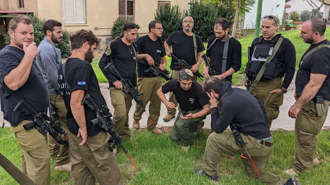 Kfar Aza guards.jpg