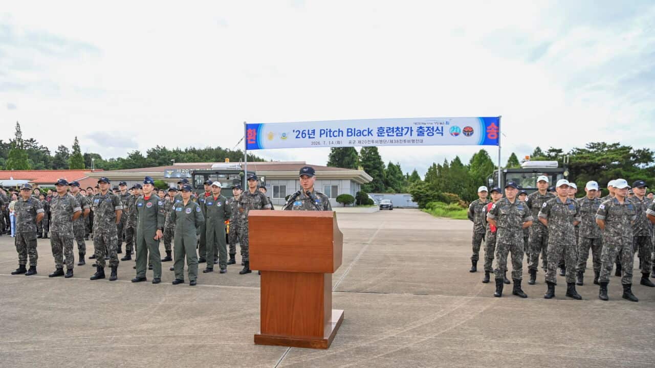 A handout photo made available by the South Korean Air Force shows Air Force Brigade General Lee Hyung-man (C), chief of the 20th Fighter Wing, giving a pep talk at an air base in Seosan, South Korea, 14 July 2.jpg