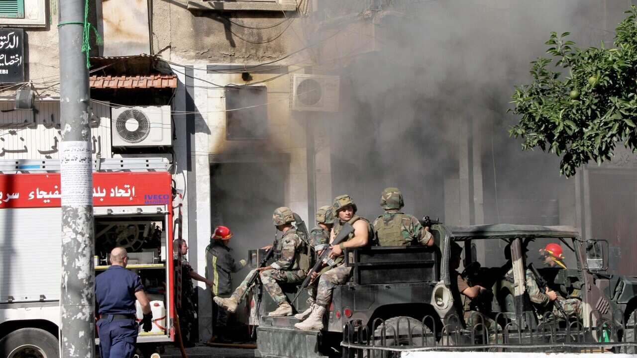 Lebanese army patrol the area where they clashed with militants in Tripoli