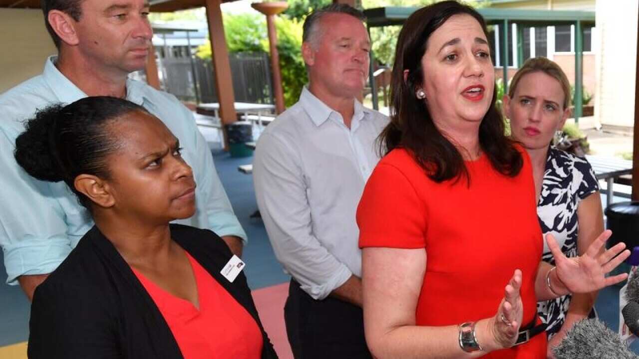Cynthia Lui with other ALP candidates and Annastacia Palaszczuk.