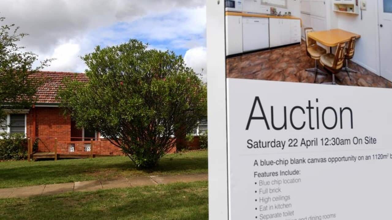 A real estate advertising board