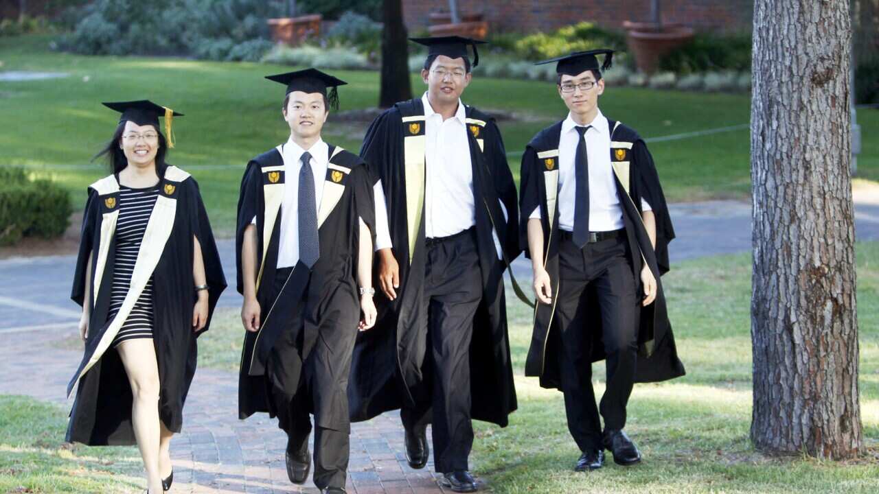Chinese students at a graduation in Perth