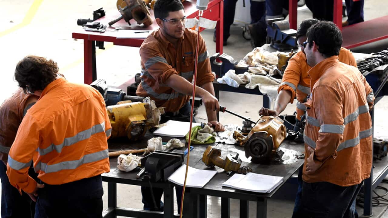 Students are seen working at the Services Trade College