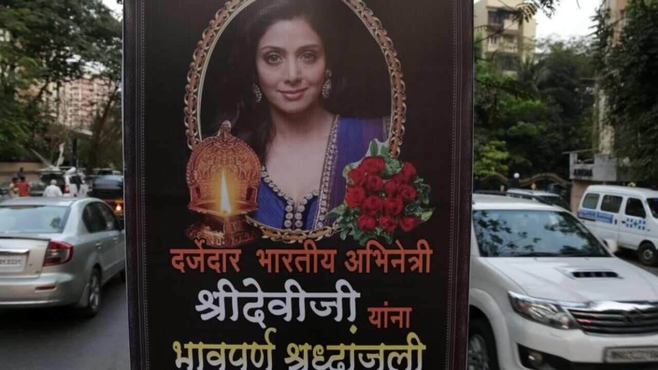 A poster of late Indian actress Sridevi Kapoor, with a condolence message is put up on display outside her residence in Mumbai, India, 27 February 2018.