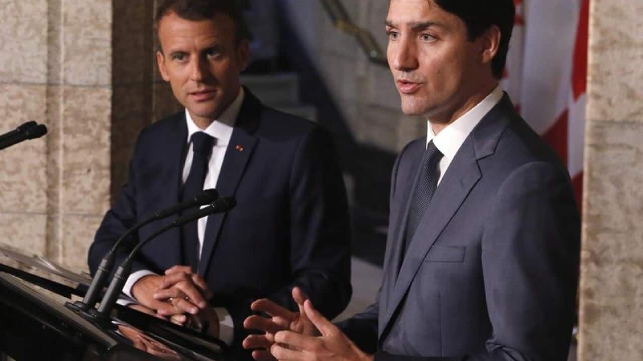 Canadian PM Justin Trudeau and French President Emmanuel Macron(left).