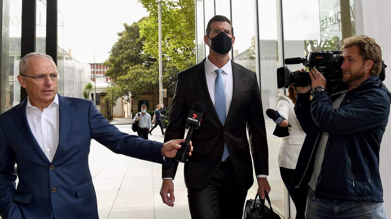 Ben Roberts-Smith (centre) arrives at the Federal Court in Sydney, Monday, February 7, 2022.