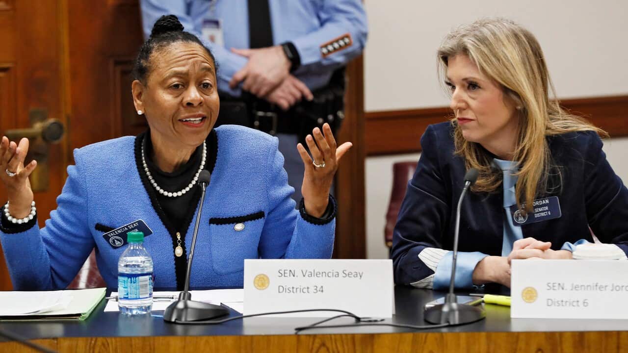 Senator Valencia Seay, left, speaks passionately against a bill concerning abortion as Senator Jennifer Jordan, right, listens.