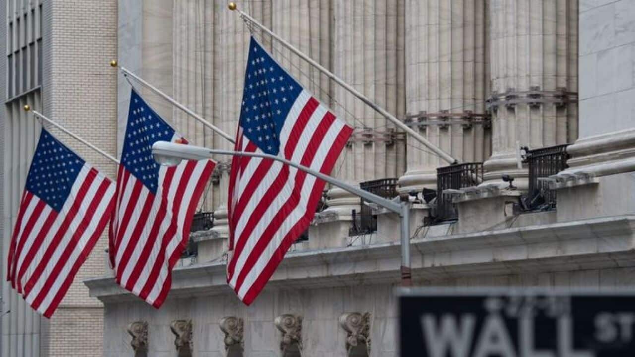 A street sign is seen near the New York Stock Exchange in New York