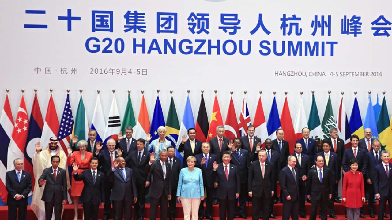 Leaders pose for a family photo during the G20 Summit in Hangzhou