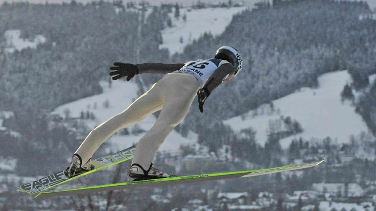 A competitor at the World Cup Ski Jumping competition in Poland