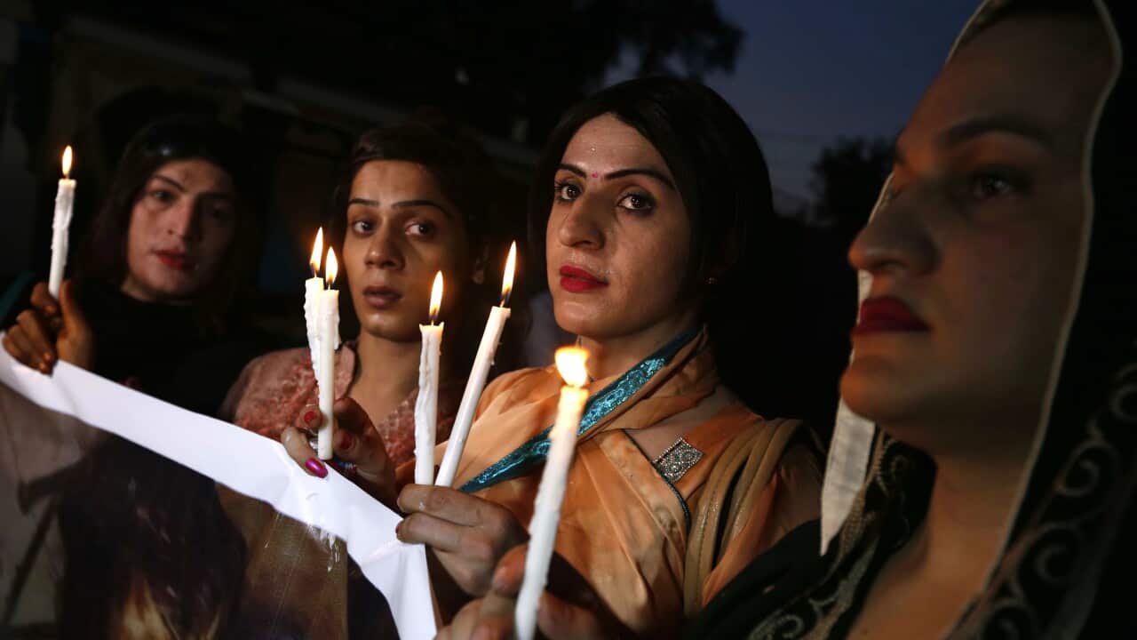 Transgenders light candles to protest the killing of one of the transgenders Sufaid, in Peshawar