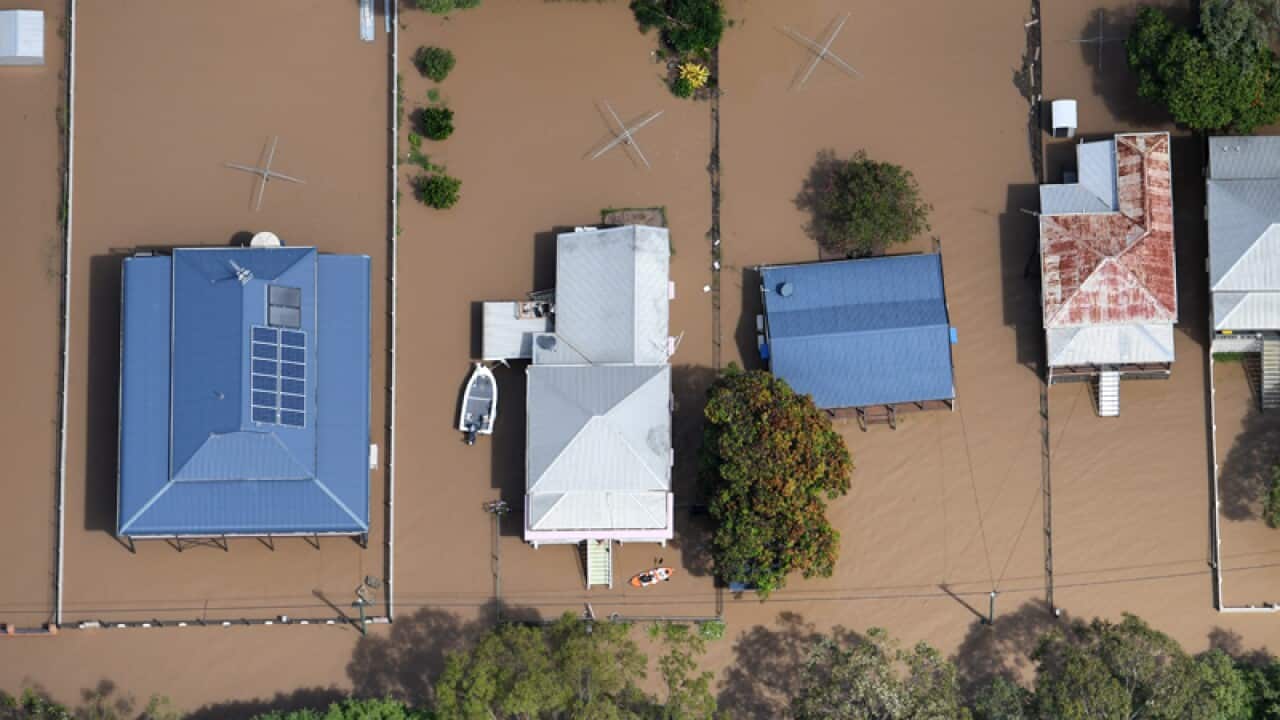 Houses are surrounded by floodwaters at Depot Hill in Rockhampton