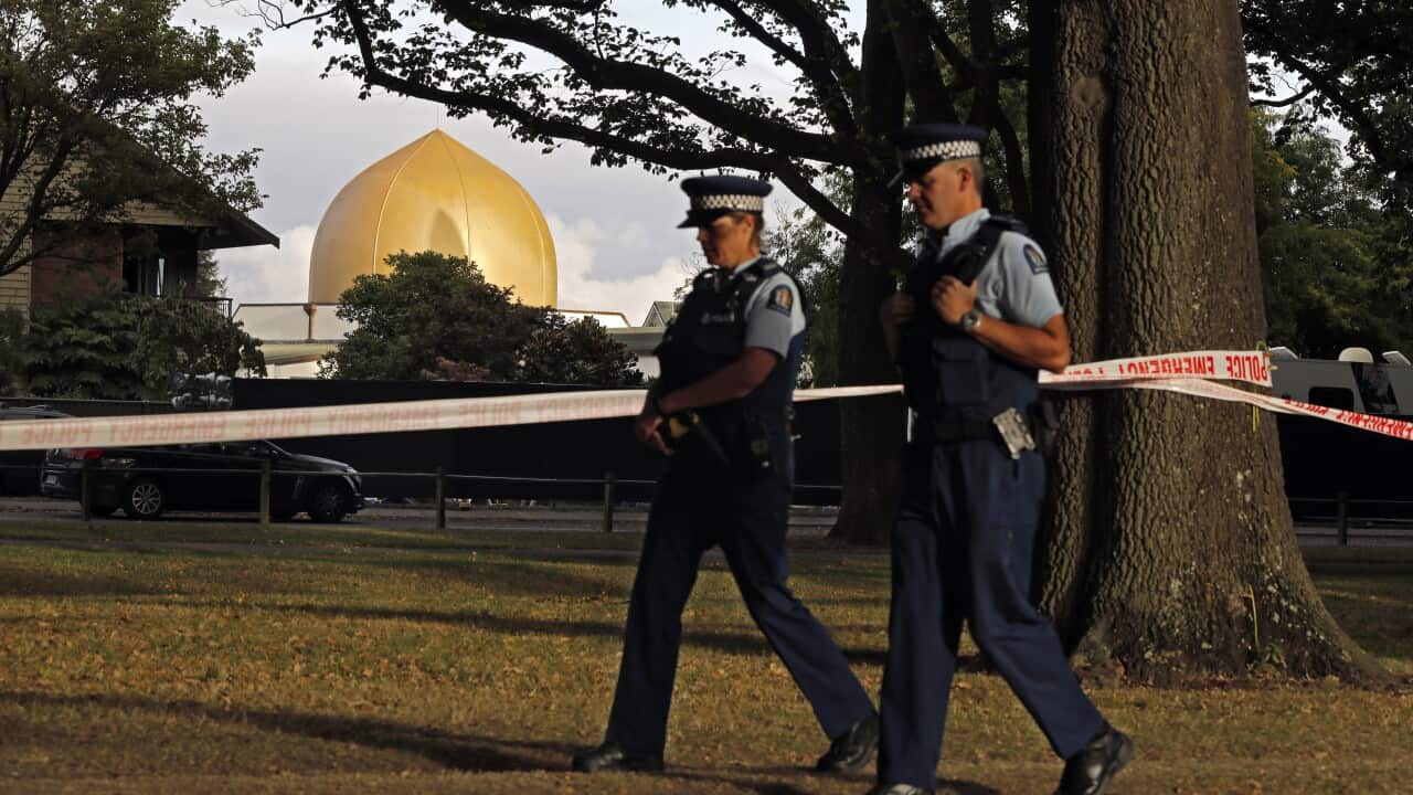 Police officers patrol at a park outside the Al Noor mosque in Christchurch, New Zealand in March last year.