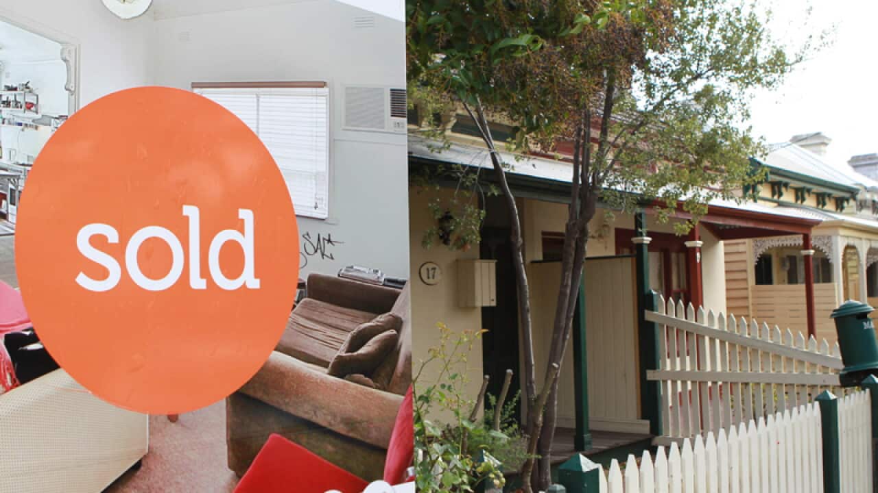 A house with a sold sign in Melbourne.
