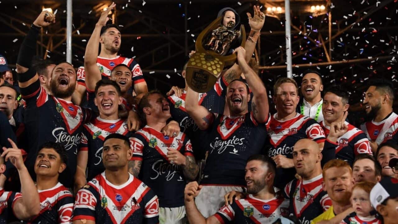 The Sydney Roosters celebrate their championship