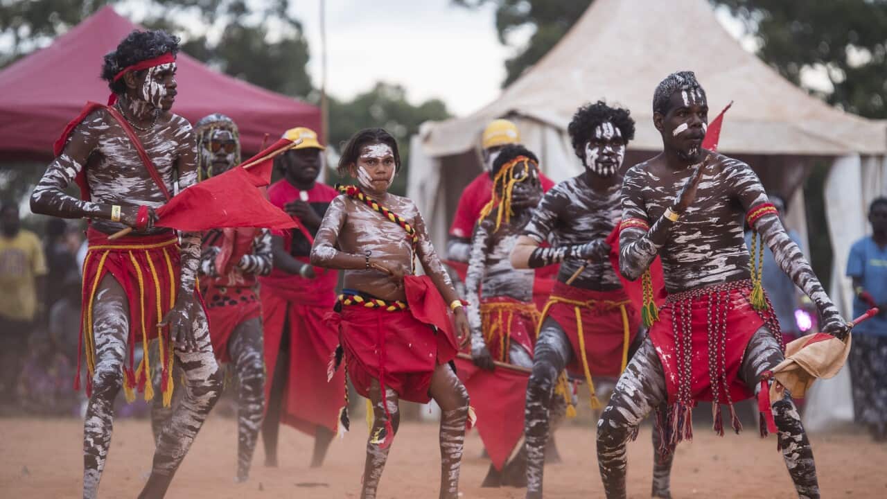 Dancers are seen during the evening ceremonial Bungul at the Garma Festival in northeast Arnhem Land