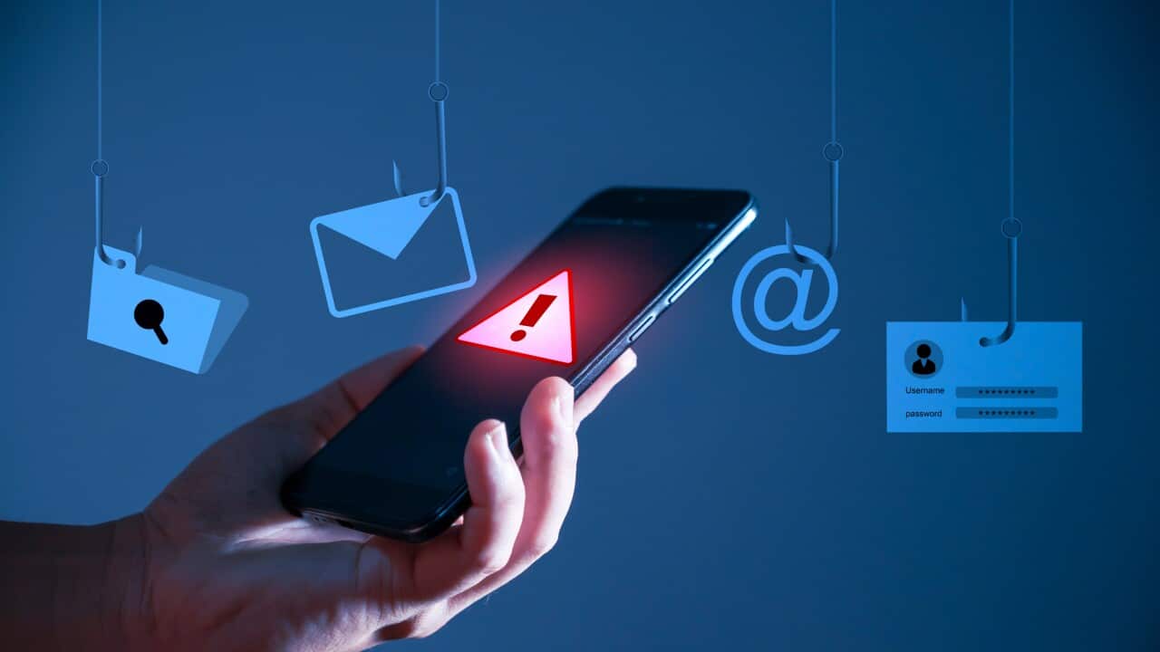 Username and password' on a fishing hook. Conceptual image about the risk of internet identity theft, also known as Phishing. fishing rod is harvesting user data in cyberspace.