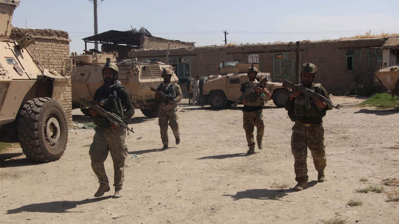 Afghan special force members attend a military operation against THE Taliban in Kunduz city, Afghanistan, on 23 July, 2021.
