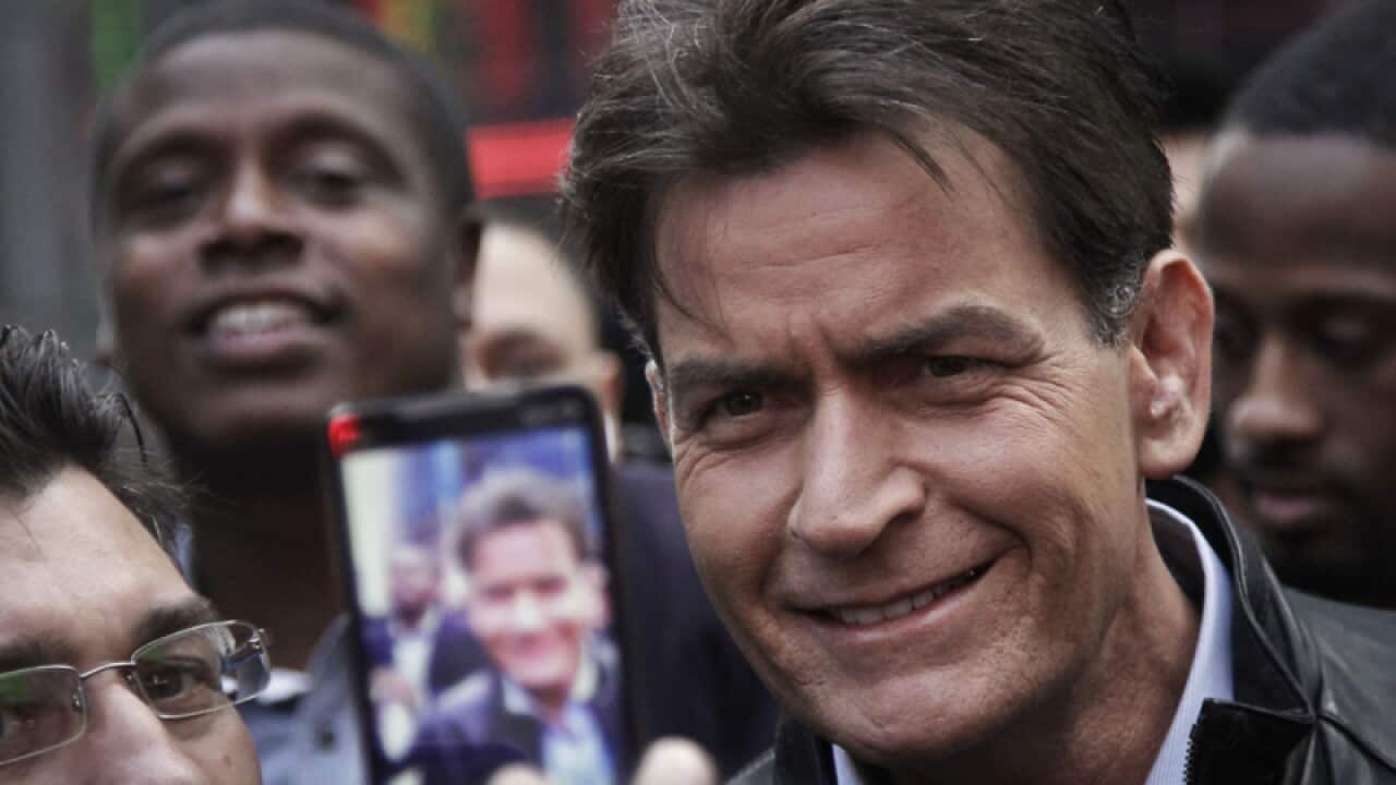 Charlie Sheen is mobbed for autographs and photos in New York