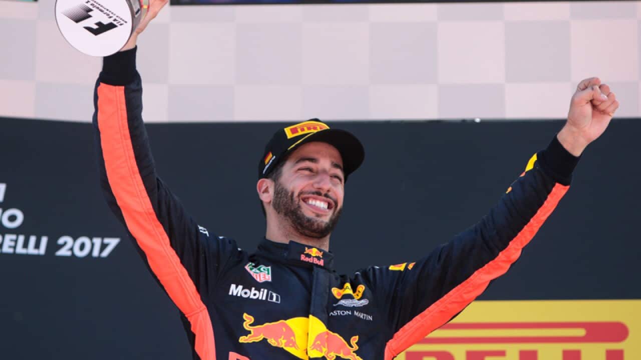 Daniel Ricciardo (AUS) Red Bull Racing celebrates his third position
