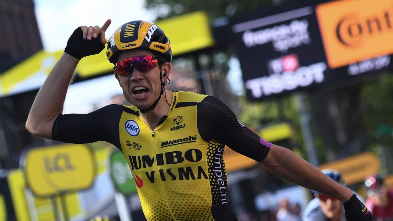 Belgium's Wout van Aert celebrates as he wins Stage 10 (Getty)