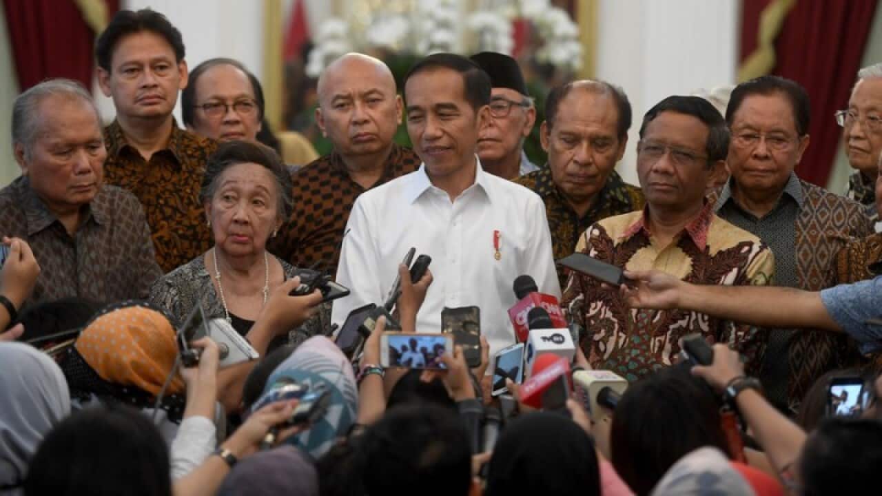 President Joko Widodo speaks to journalists after a meeting with a number of prominent political figures who urged him to issue a presidential decree in lieu of the amended law on the Corruption Eradication Commission.