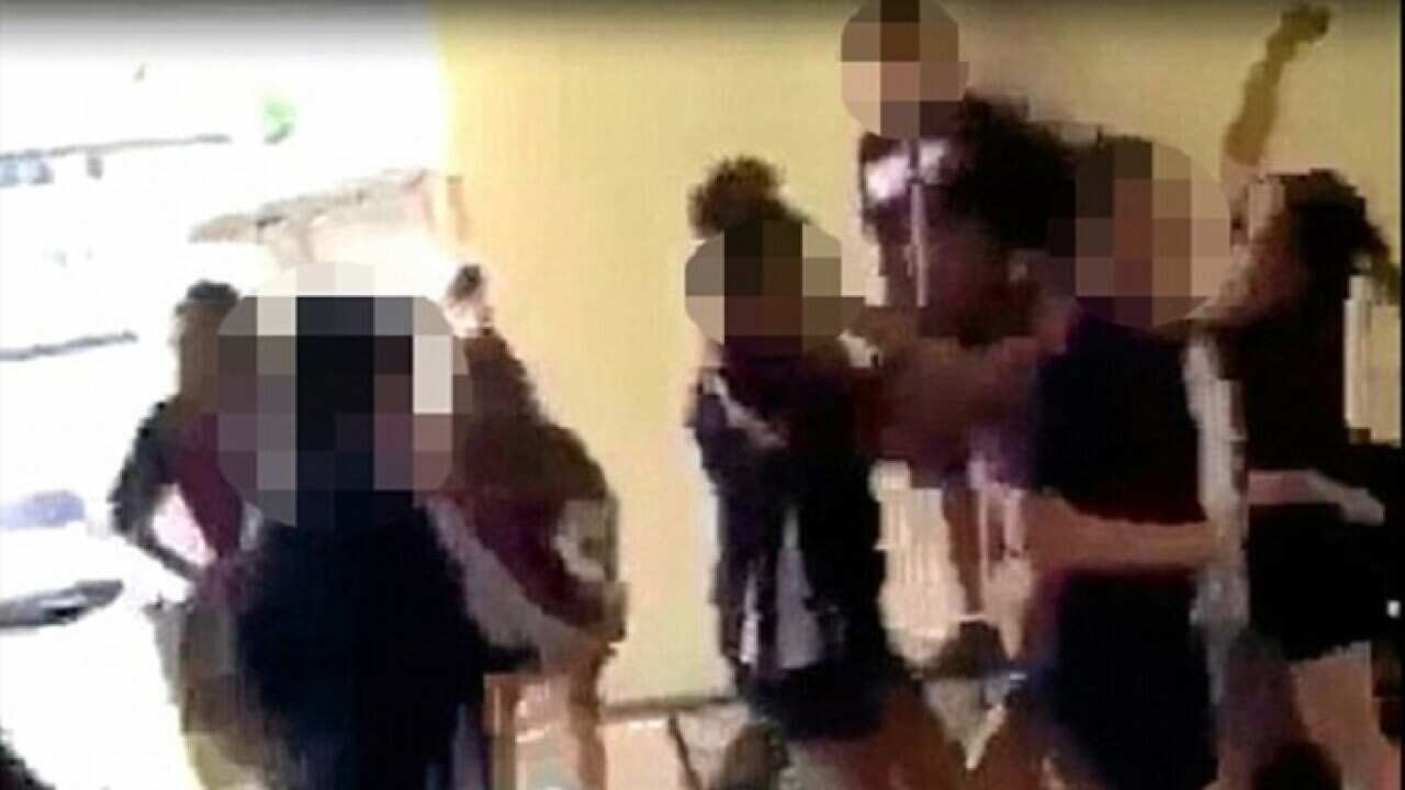 At least six students, most of them female, have been suspended from the Mackay State High School in Queensland after a massive brawl broke out