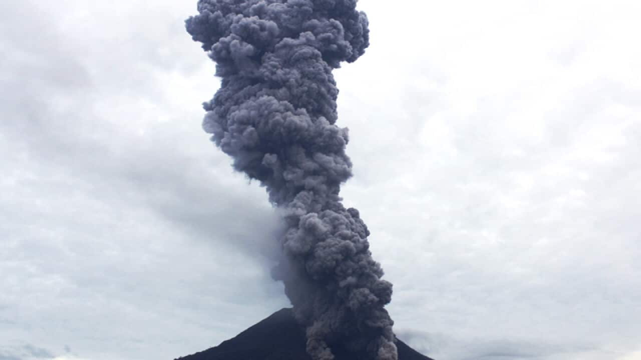 Mount Sinabung spews volcanic materials as it erupts.