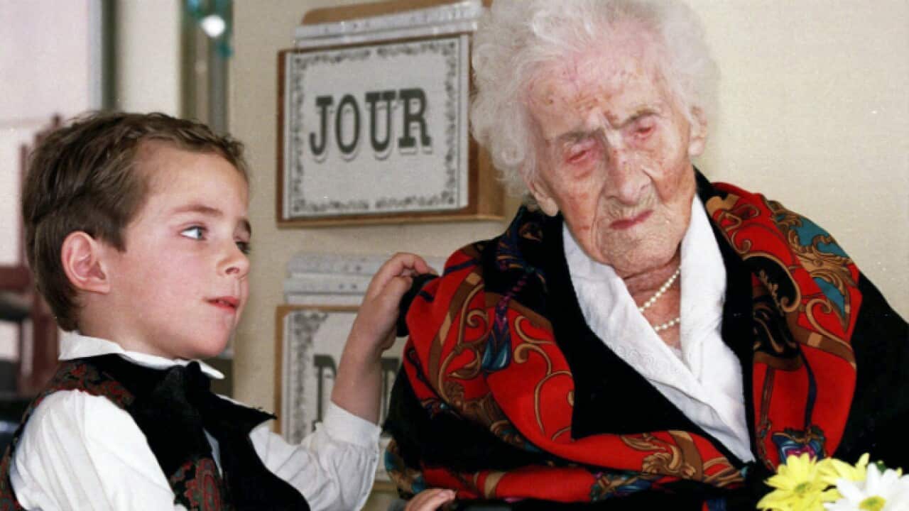 Jeanne Calment after he brought her flowers at her retirement home in Arles, southern France.