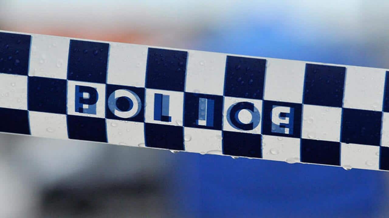 Police tape restricts access to a crime scene north of Sydney, Friday, July 24, 2015. (AAP Image/Joel Carrett) NO ARCHIVING