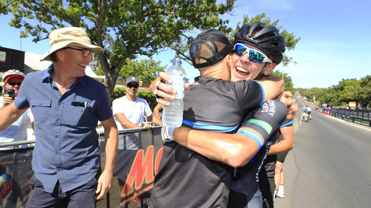 Chris Hamilton celebrates his Under-23 road title with his dad