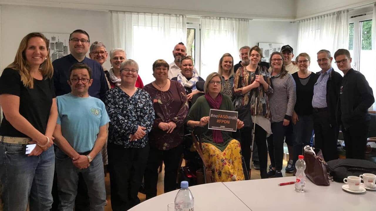The Australian delegation meets with the Canadian delegation before giving their opening statements.