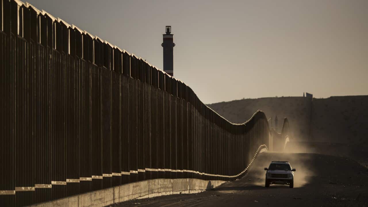 A Border Patrol vehicle drives along the border fence in Sunland Park, N.M., across from Ciudad Juarez, Mexico, June 24, 2018.
