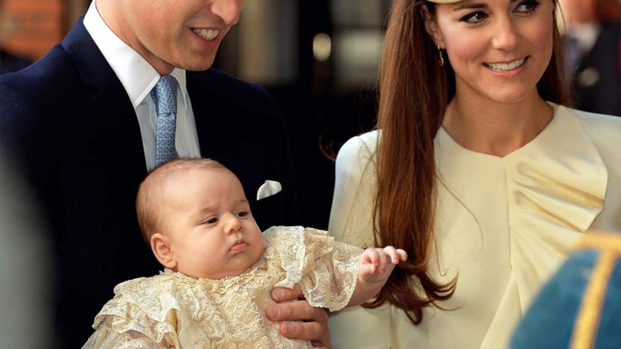 File photo of Prince William and Kate with baby George