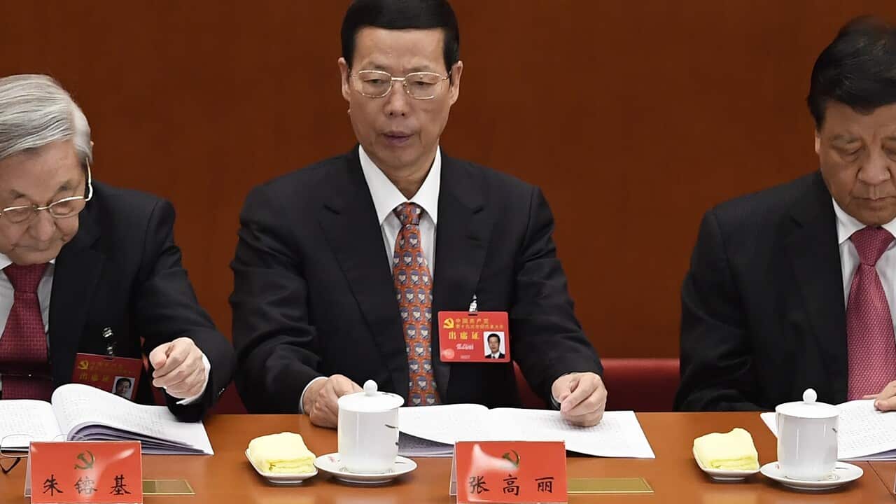 Zhang Gaoli attends the opening session of the 20th National Congress of the Communist Party of China