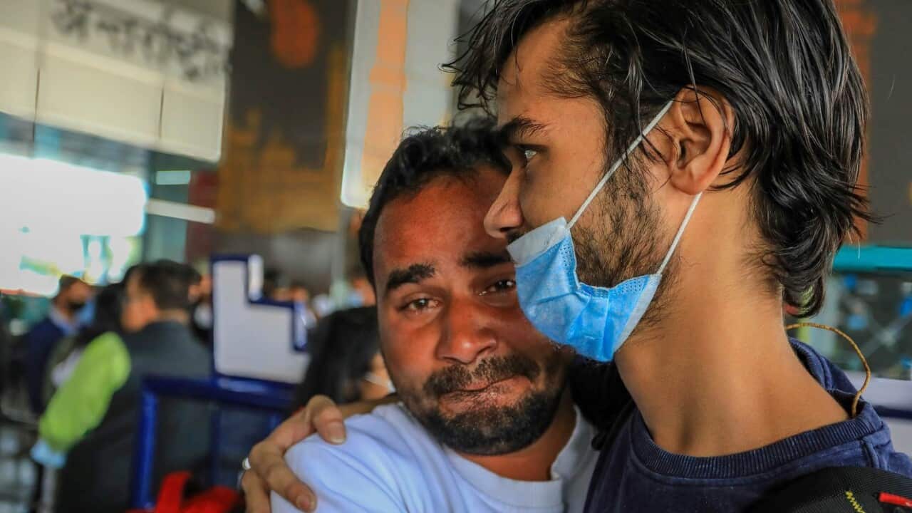 An Indian student is welcomed by his family member after being evacuated from Ukraine at Indira Gandhi International airport.