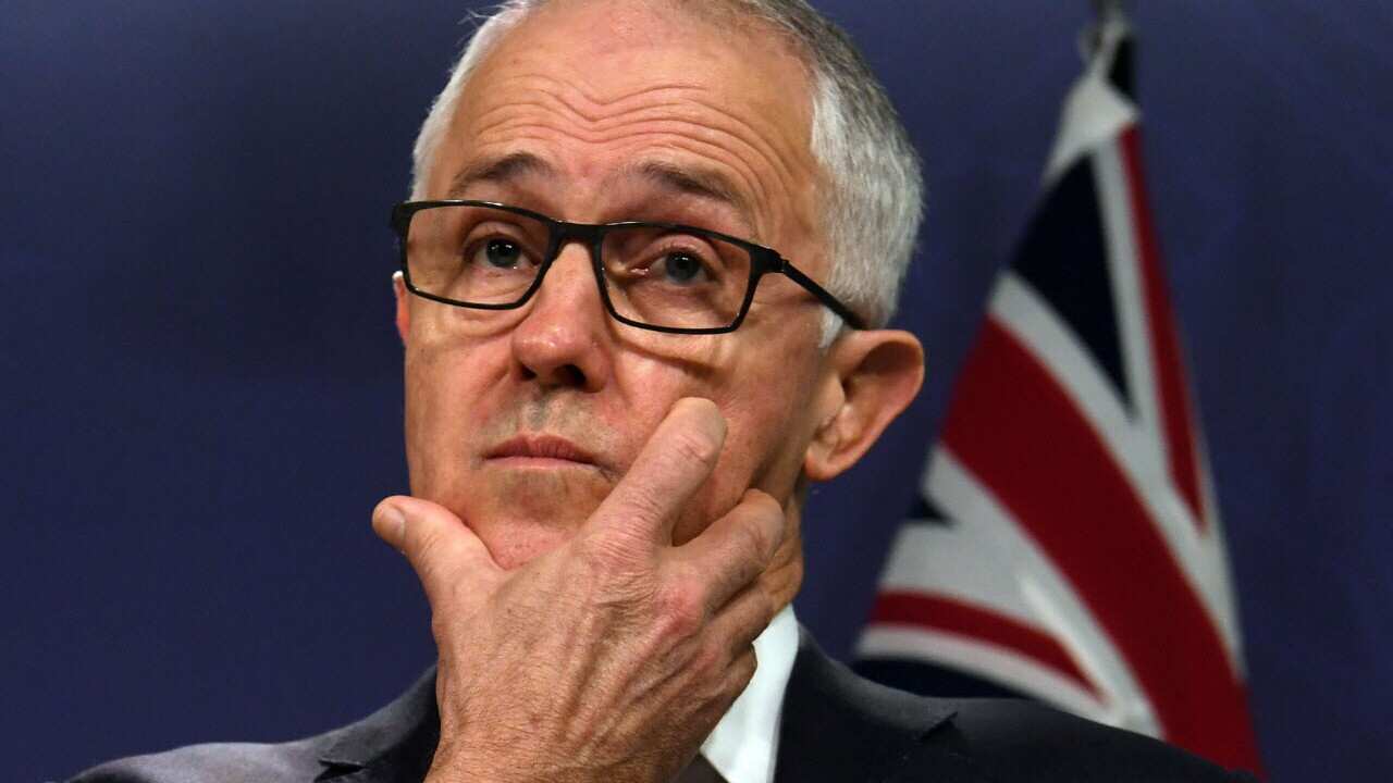 Australian Prime Minister Malcolm Turnbull reacts during an address to media.