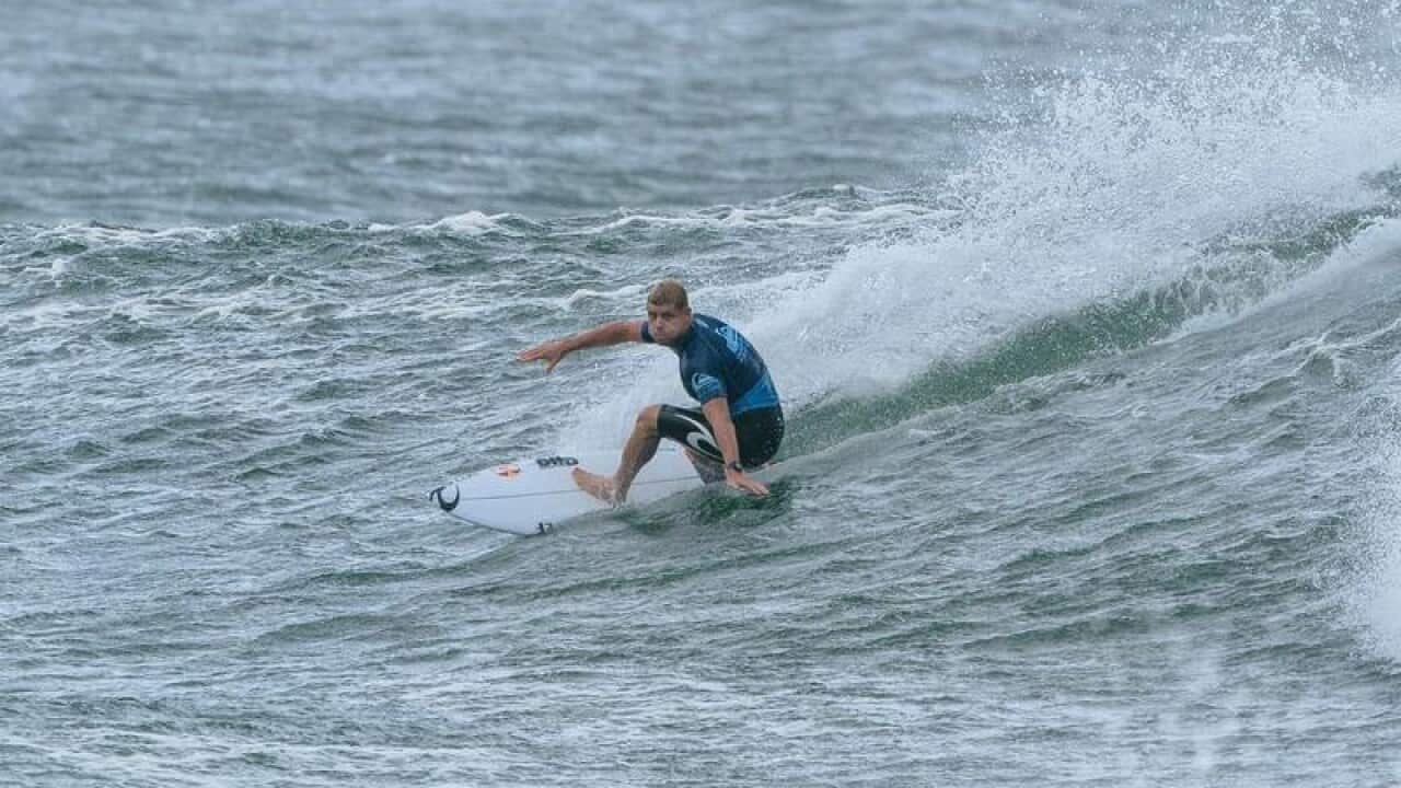 Three time world champion surfer Mick Fanning poses for a portrait.